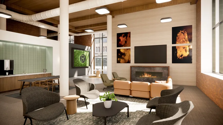 The fireplace lounge: lounge chairs and a leather sofa around a linear fireplace, with large artworks and a coffee counter